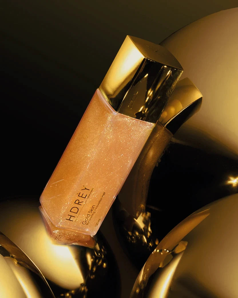 Rozświetlająca mgiełka do twarzy i ciała z efektem Gold Skin 120 ml
